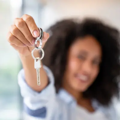 Person holding key up