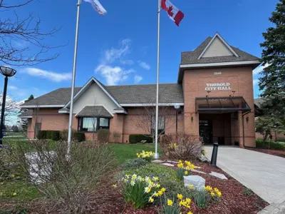 Blue background with images of people and City Hall and text that reads "City of Thorold Strategic Plan"