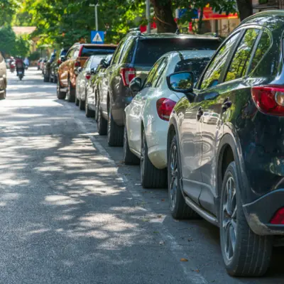 Cars parked on side of road